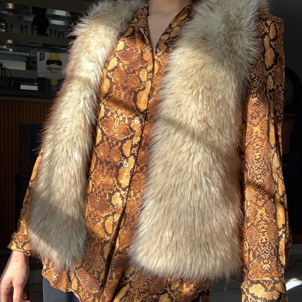 Zara snakeskin high low blouse in a size small